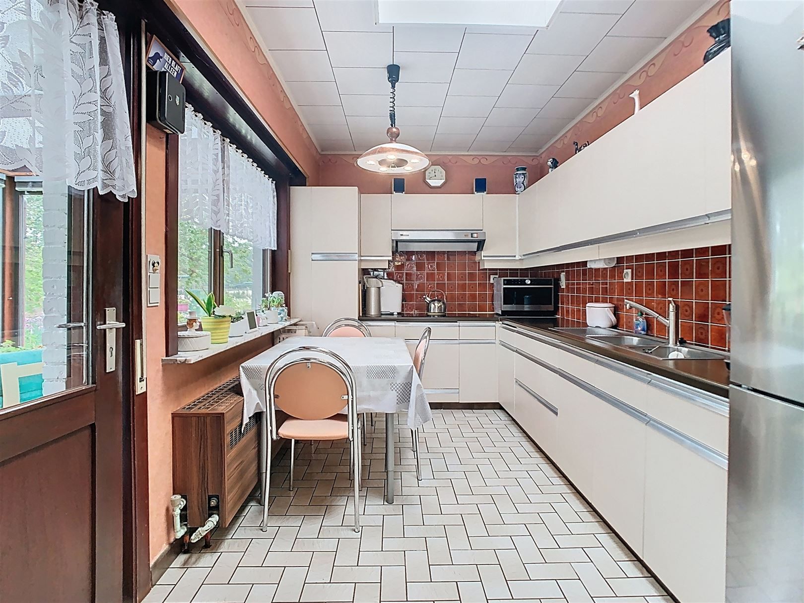 Goed onderhouden woning, met 3 slpk. en een landelijke ligging!! foto 8