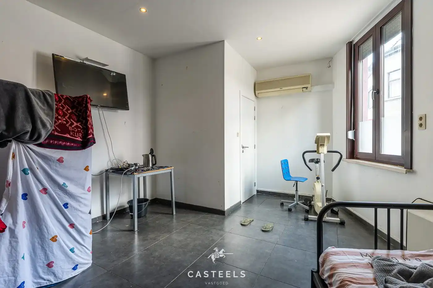 Instapklare opbrengsteigendom met handelsruimte en woonst op toplocatie in Ledeberg foto 12