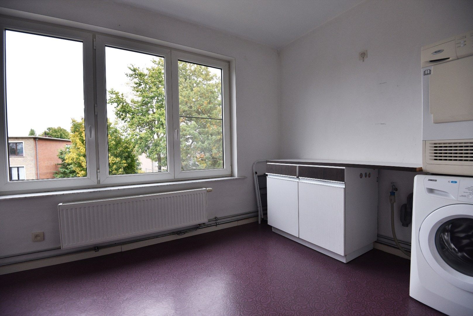 Ruim appartement (108m2) met 2 slaapkamers en autostaanplaats rustig gelegen te Eeklo foto 5