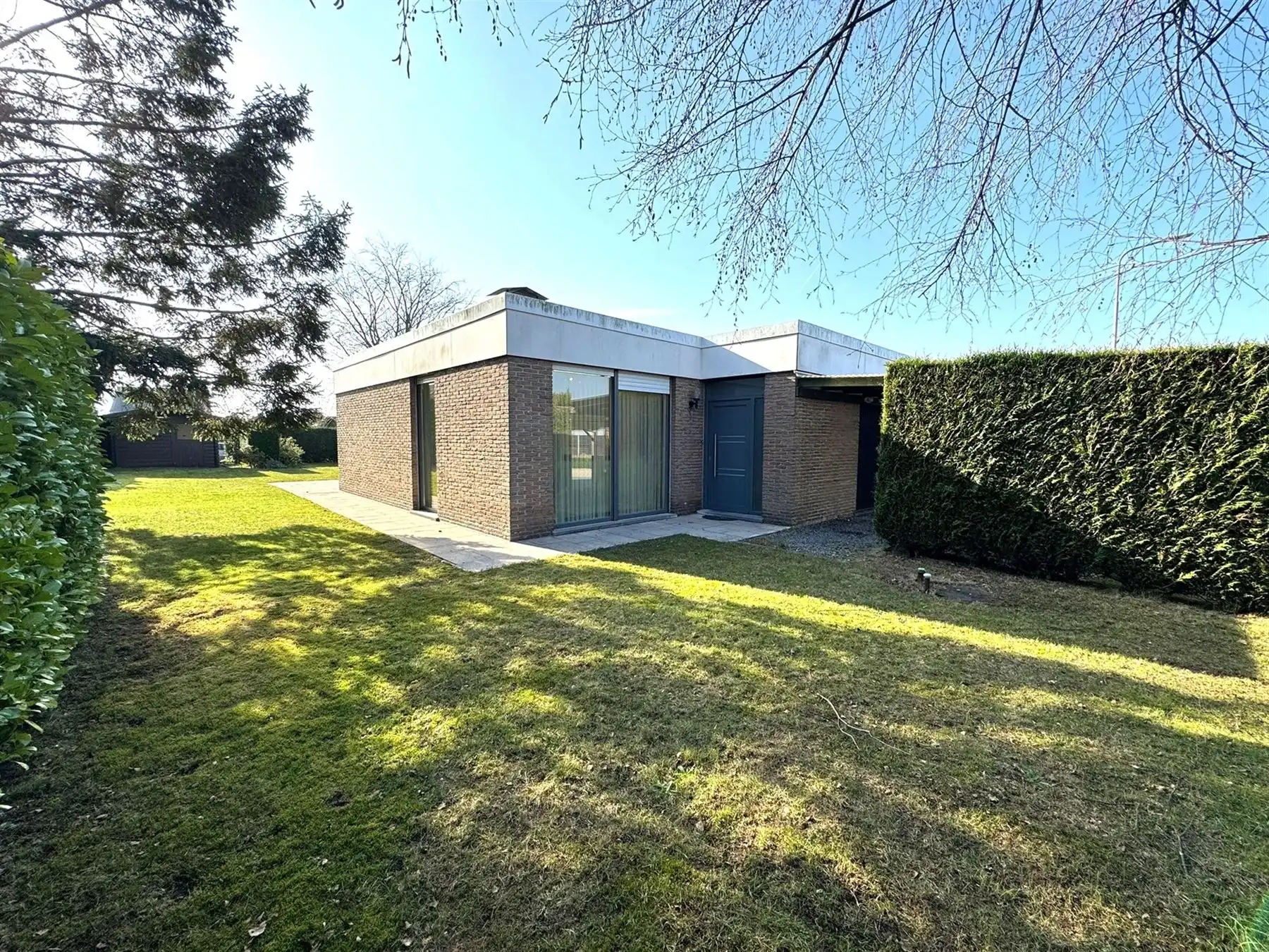 Gelijkvloerse woning met zonnige tuin in rustige woonbuurt foto 2