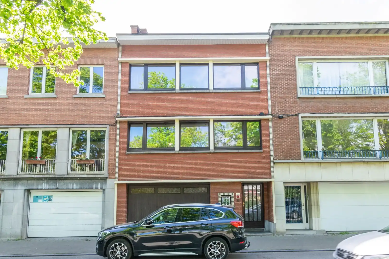 Een opbrengsteigendom bestaande uit 2 appartementen,  garage en tuin.  foto 17