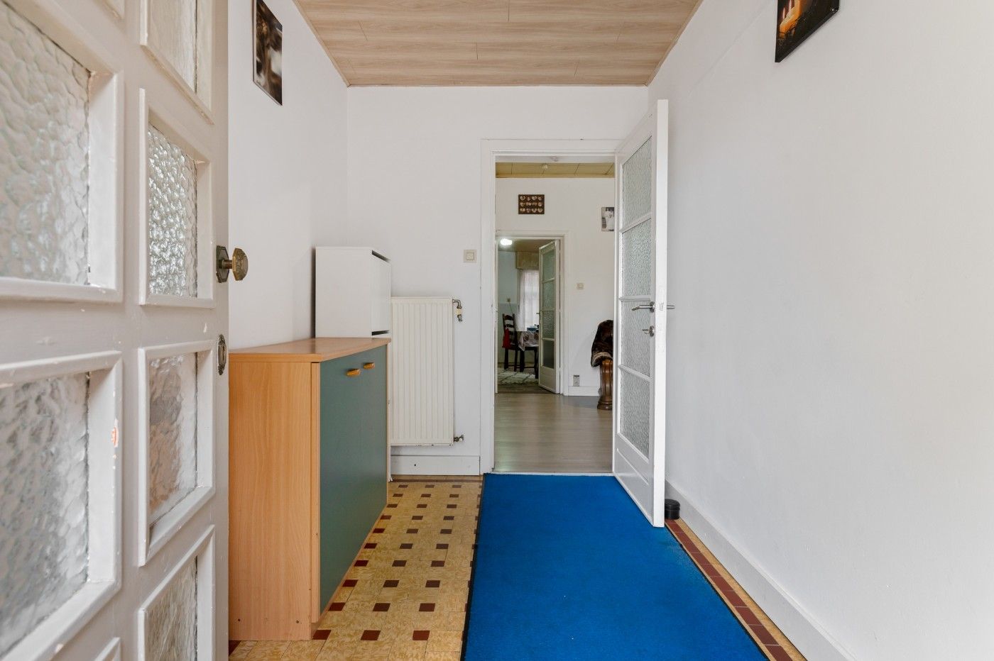 Te renoveren woning met 3 slpk. en tuin foto 2