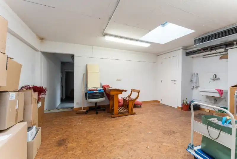 Genoveerd appartementsgebouw met drie appartementen en handelsruimte foto 5