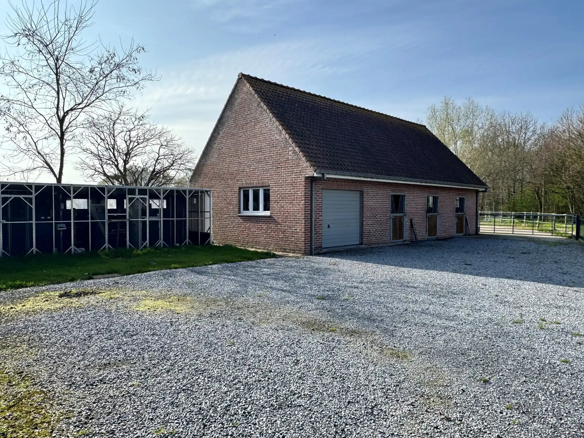 Alleenstaande woning met naastliggend stuk bouwgrond en weide te Eernegem foto 10