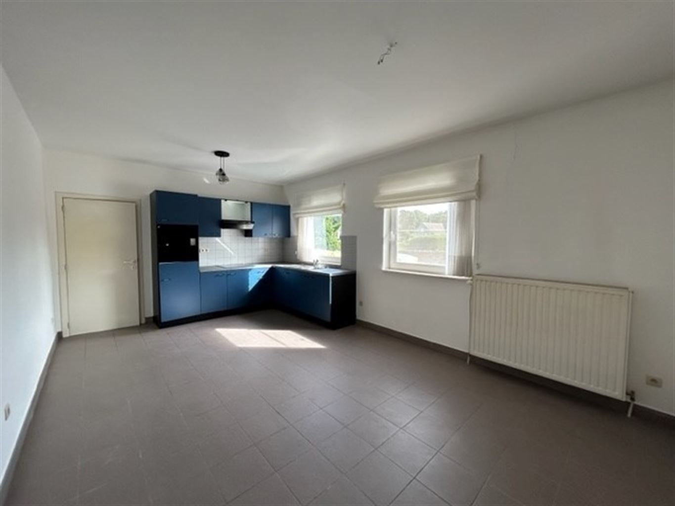 Gezellig appartement met 1 slaapkamer en carport. foto {{pictureIndex}}