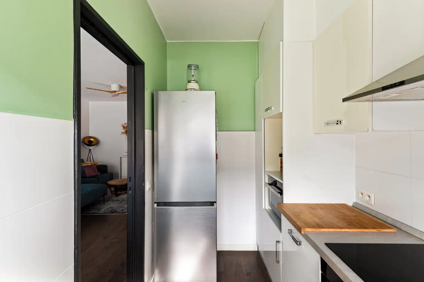 Keurig gerenoveerd, gelijkvloers appt. met 2 slpk., terrasje en garagebox foto 8