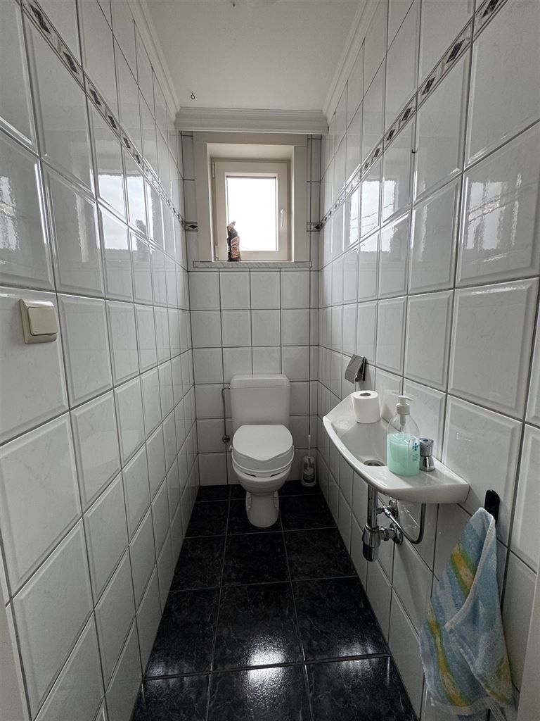 Ruim gelijkvloers appartement met 2 slaapkamers, terras en autostaanplaats te Kinrooi.  foto 12