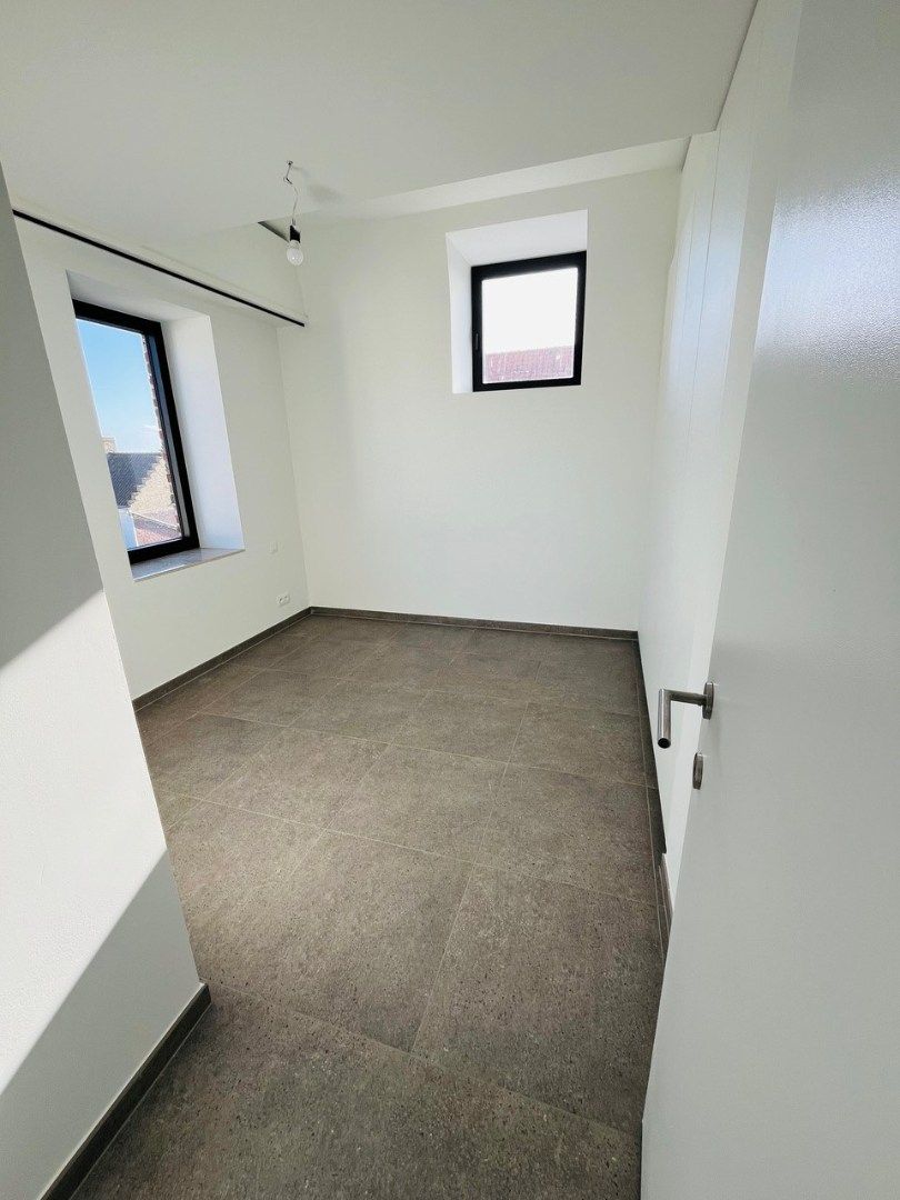 Uniek 3-slaapkamerappartement in het voormalige gemeentehuis van Vleteren foto 10