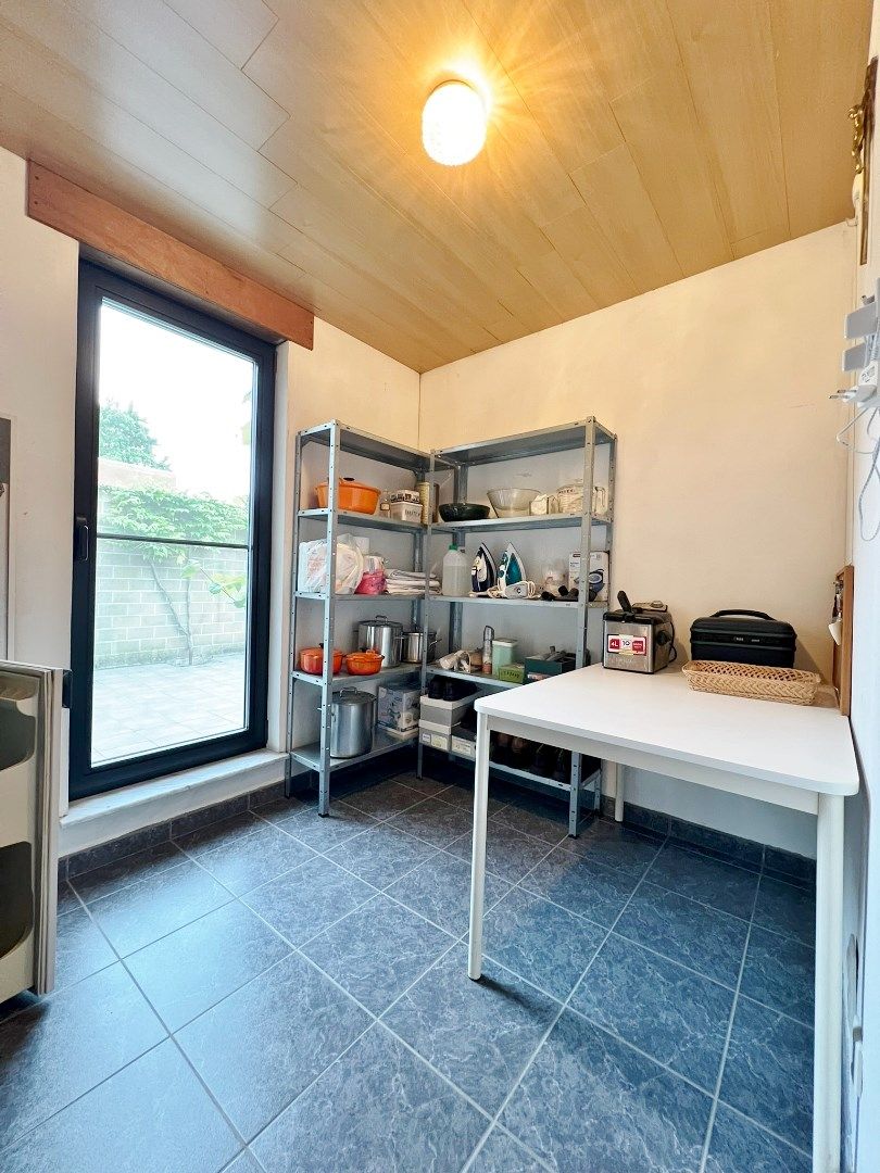 Instapklare woning met garage en ruime koer/tuin op centrale ligging te Ieper foto 12