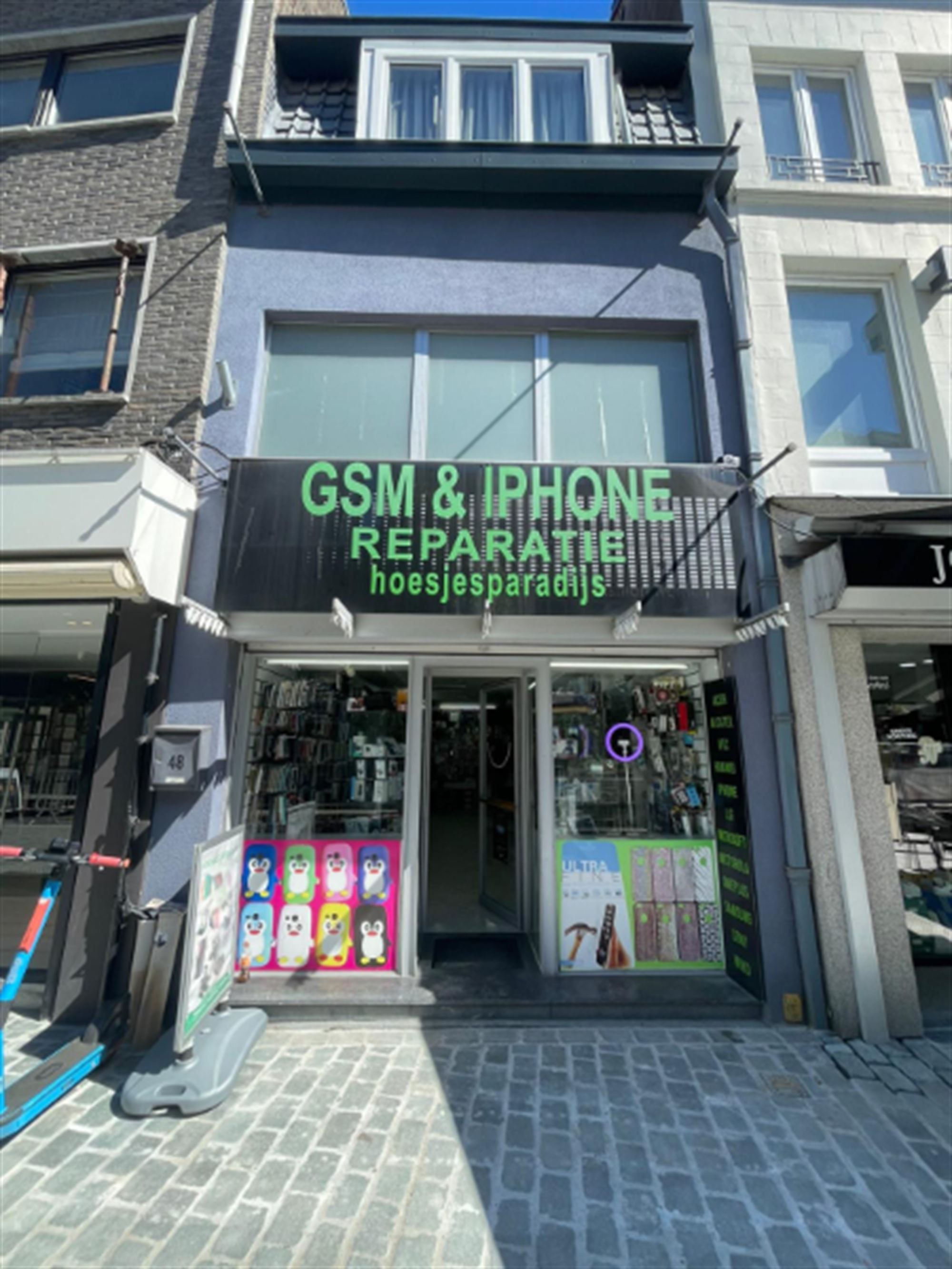 Commercieel gebouw in winkelstraat te Aalst foto {{pictureIndex}}