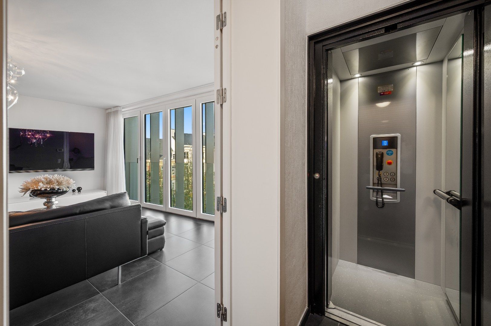 Instapklare, moderne penthouse op de Grote Markt in Tienen foto 3