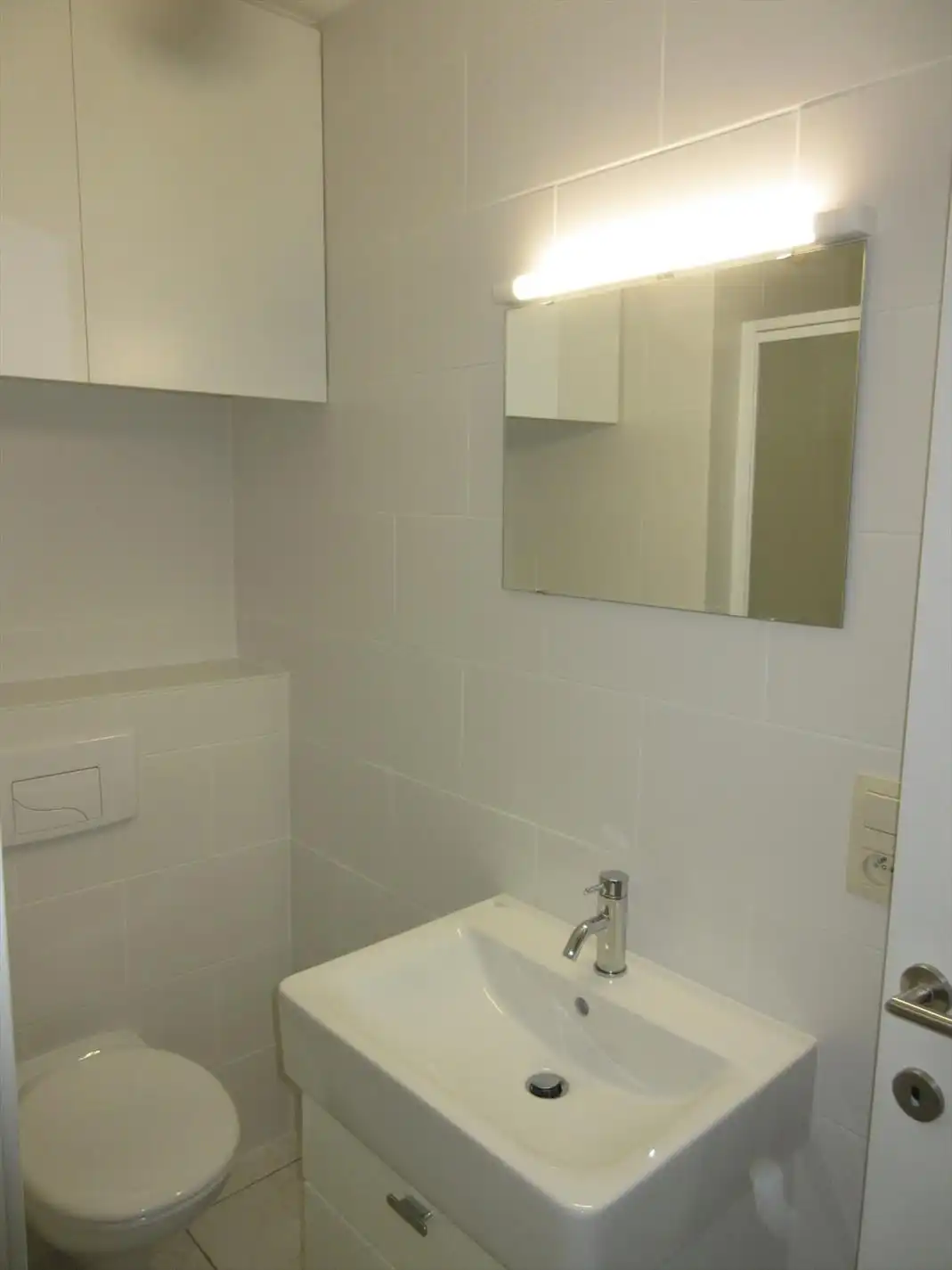 Volledig gerenoveerd 2 slaapkamer appartement met zonnige koer! foto 10