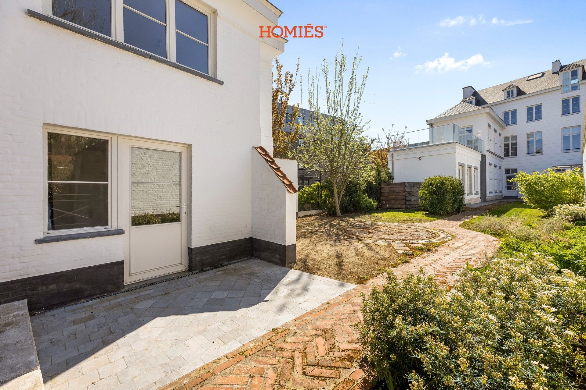 High-end gelijkvloers appartement met tuin, in historisch pand foto 16