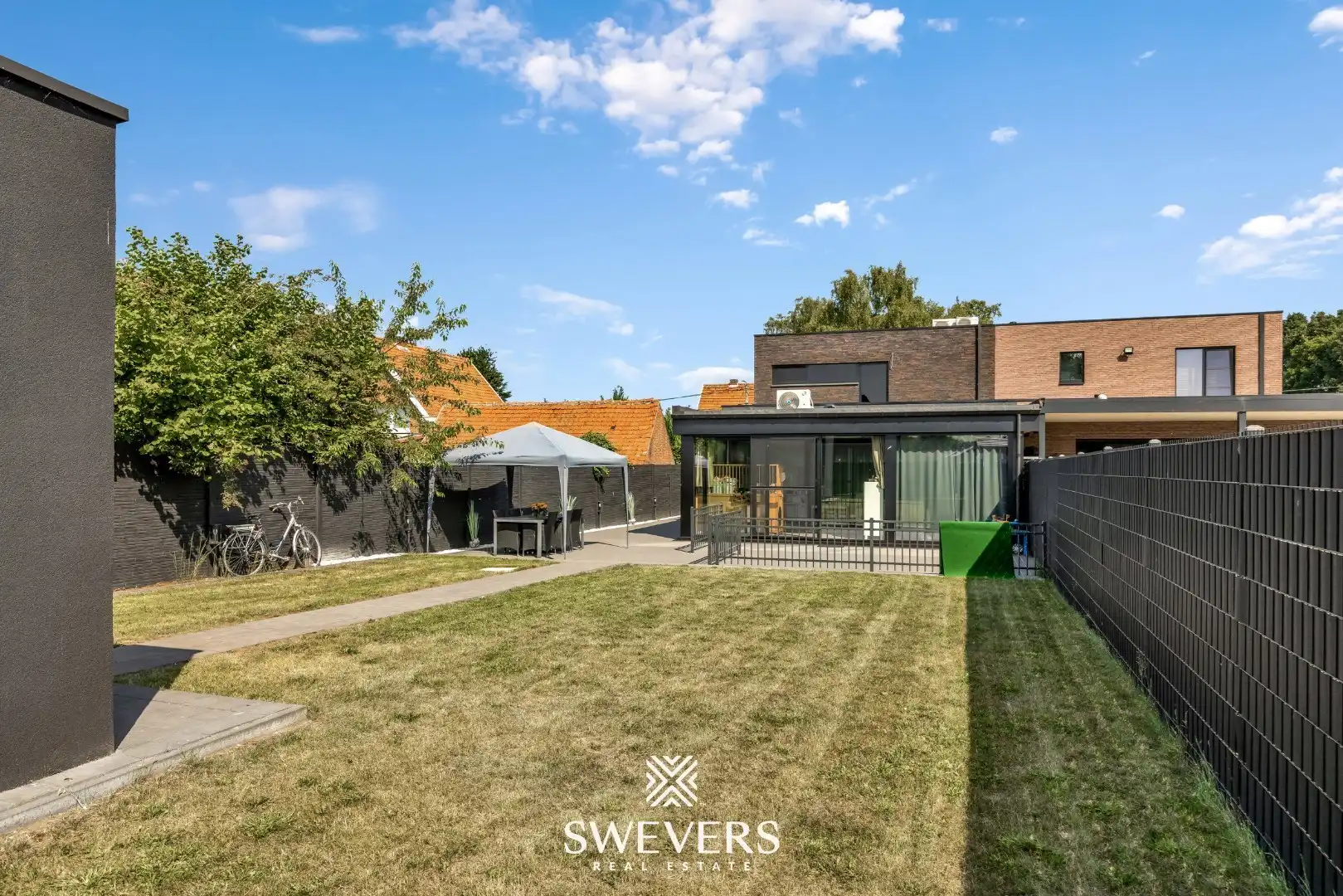 Stijlvol wonen op een ruim perceel met 4 slaapkamers en topafwerking foto 35