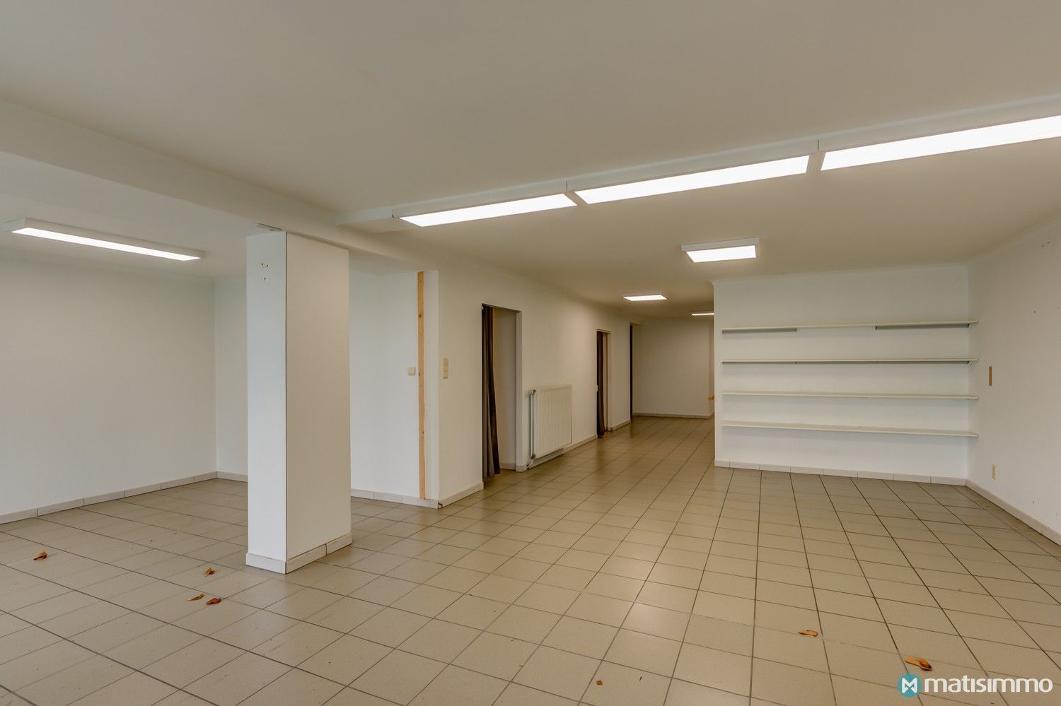 GOED GELEGEN HANDELSRUIMTE MET RIANT WOONGEDEELTE IN CENTRUM VAN HOESELT foto 14