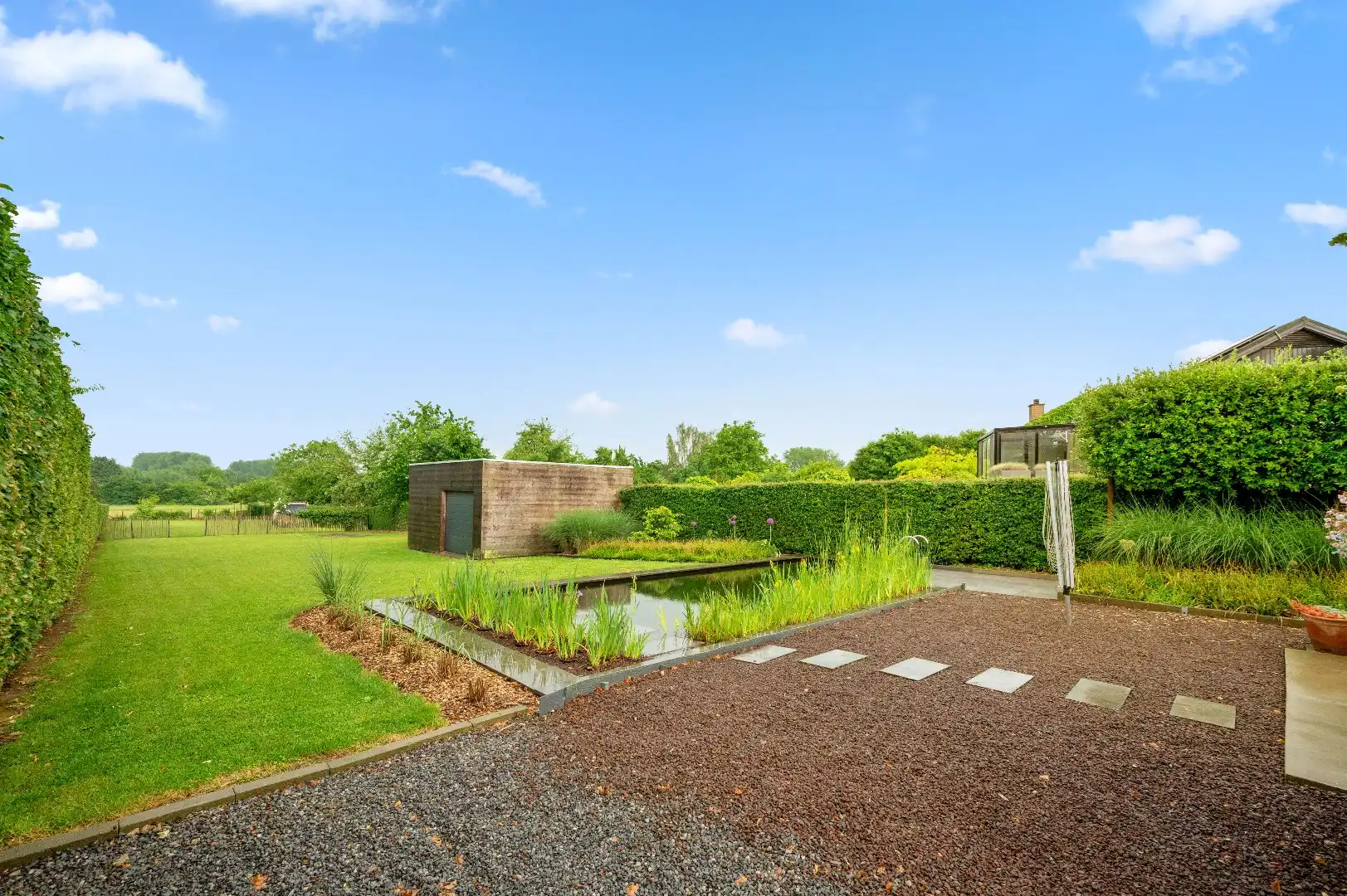 Moderne open bebouwing met prachtige tuin met zwemvijver gelegen in het rustige Eliksem (Landen) foto 21