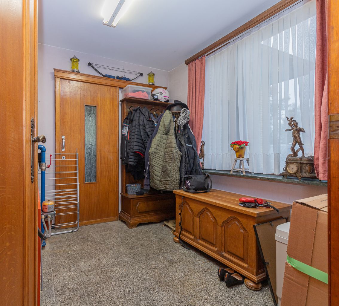 Ideaal gelegen bungalow met 3 slpk, tuin en garage foto 12