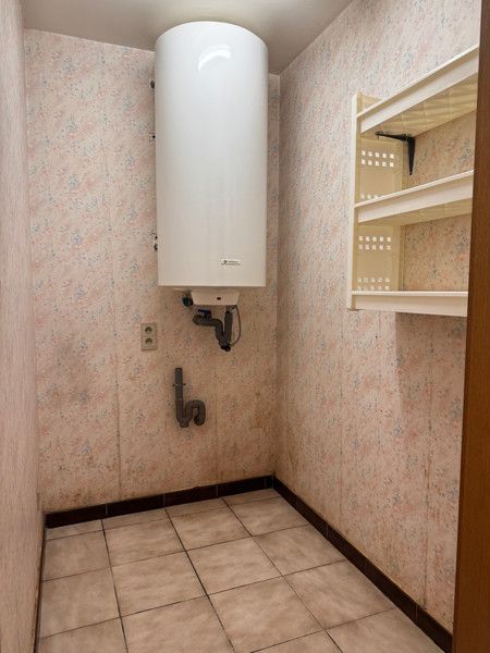 Gelijkvloers appartement met 2 slpkms, autostaanplaats en private berging foto 15