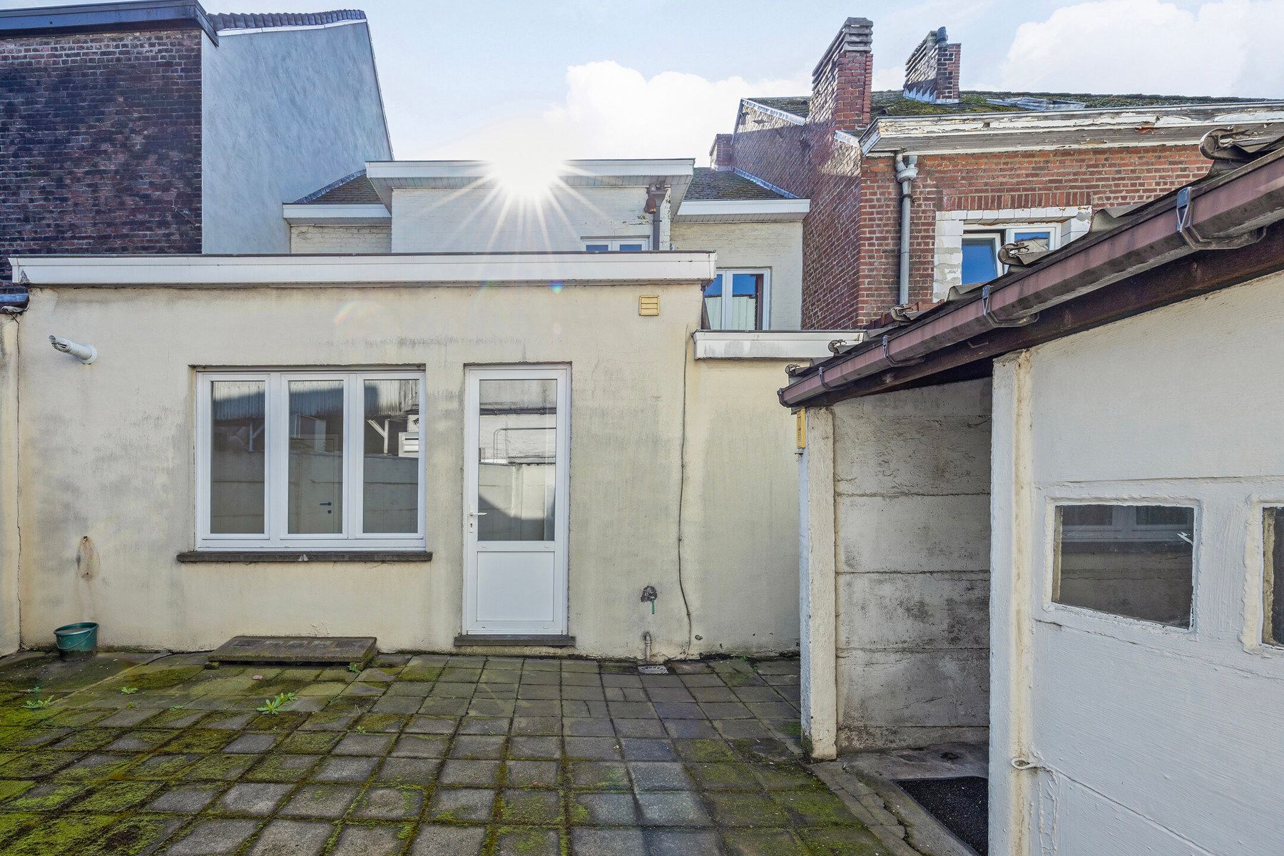 Handelshuis, ingedeeld als commerciële ruimte + appartement foto 27
