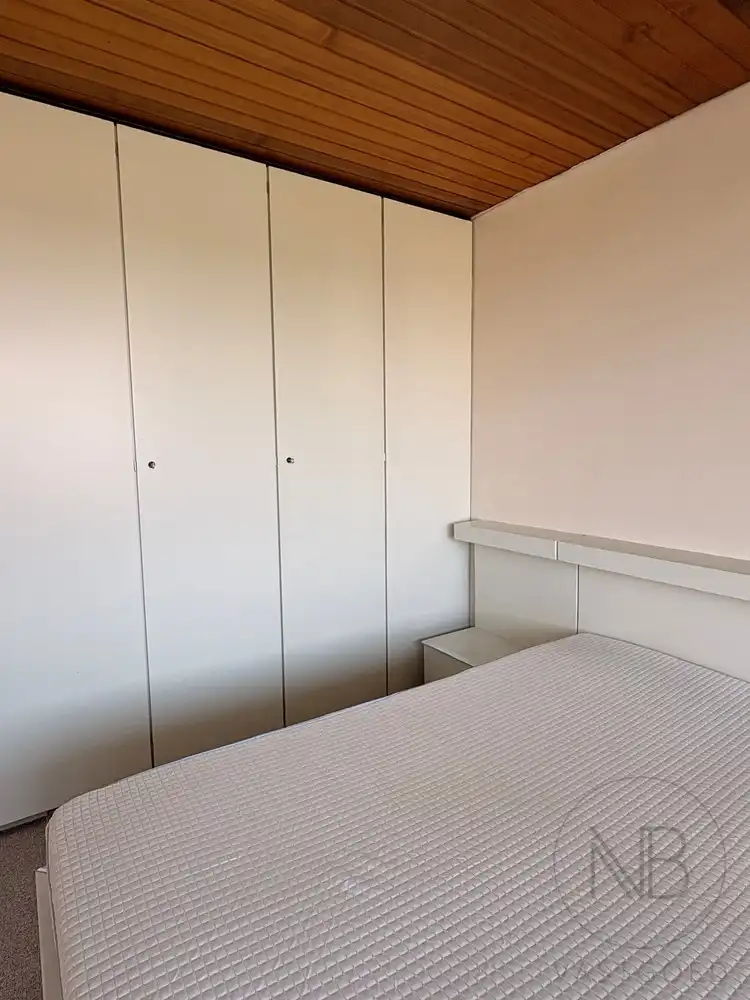 Stijlvol gerenoveerd en bemeubeld appartement met panoramisch uitzicht in hartje Genk foto 8