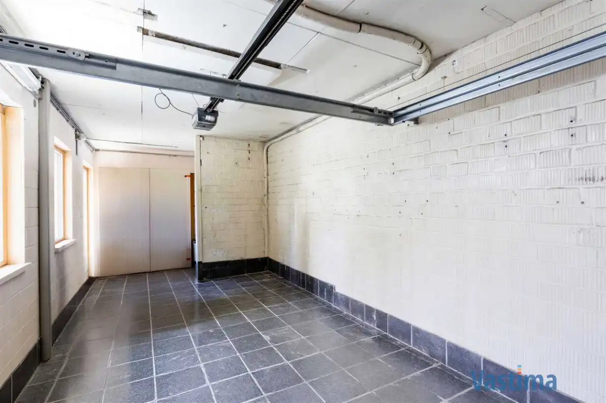 Lichtrijke halfopen bebouwing met 3 slaapkamers, tuin en garage foto 25