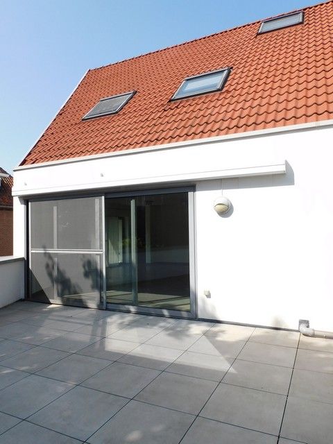 Ruim duplex appartement met 3 slaapkamers in het centrum   foto 2