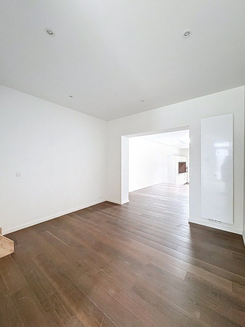 Elegant wonen in Tienen: gerenoveerde rijwoning met 3 slaapkamers en zuidwestgerichte tuin. foto 5