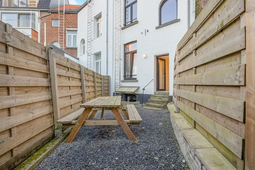 Opbrengsteigendom met 5 gerenoveerde studentenkamers foto 17