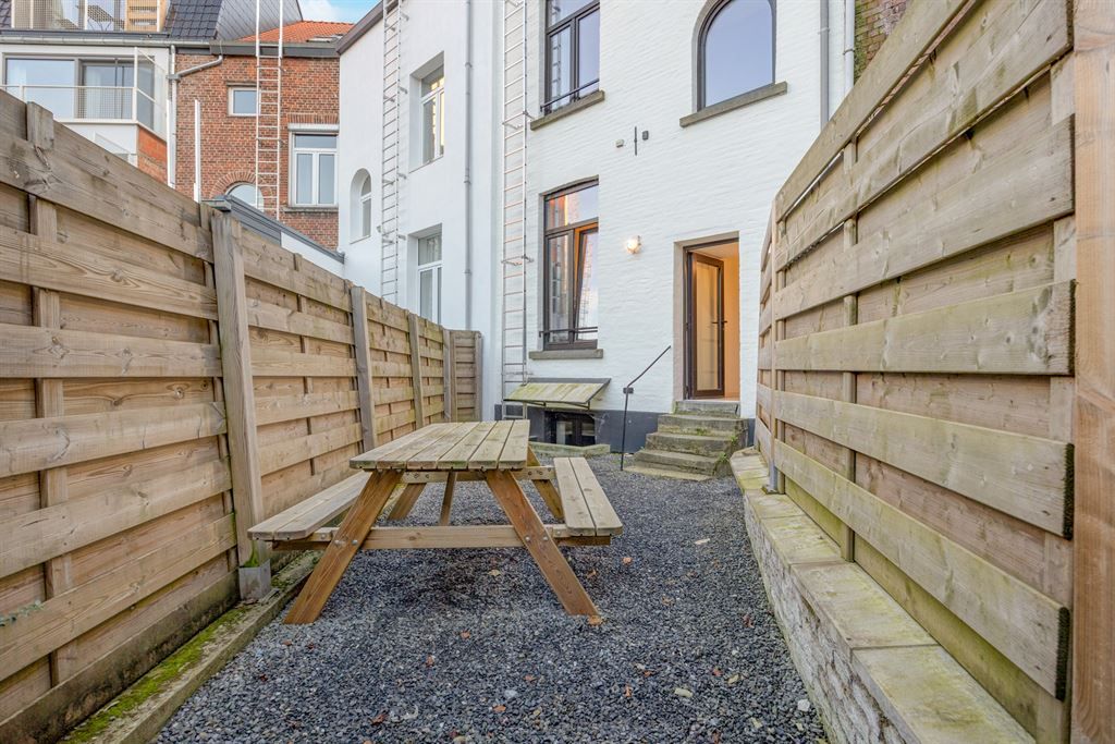 Opbrengsteigendom met 5 gerenoveerde studentenkamers foto 17