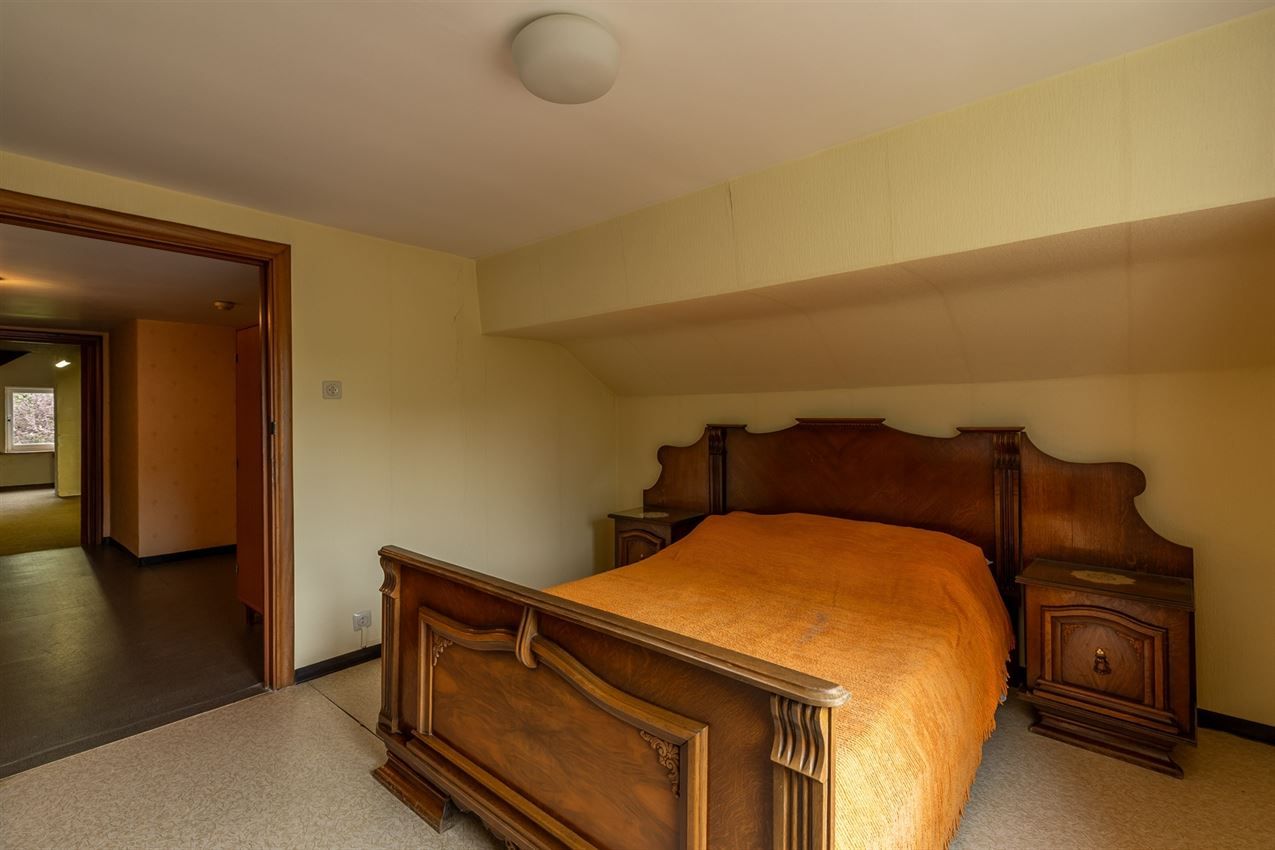 Te renoveren woning met 4 slk. in het hart van Averbode foto 25