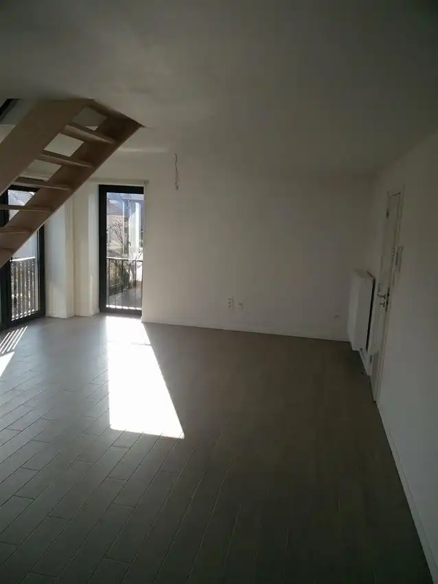 zonnige duplex, 2 slpk., autostaanplaats en tuindeel foto 12