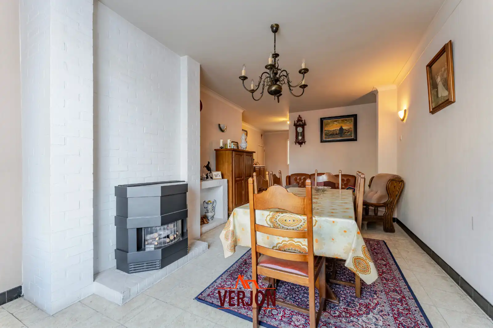 Charmante woning met ruime tuin te koop op het dorpsplein in Kachtem! foto 3