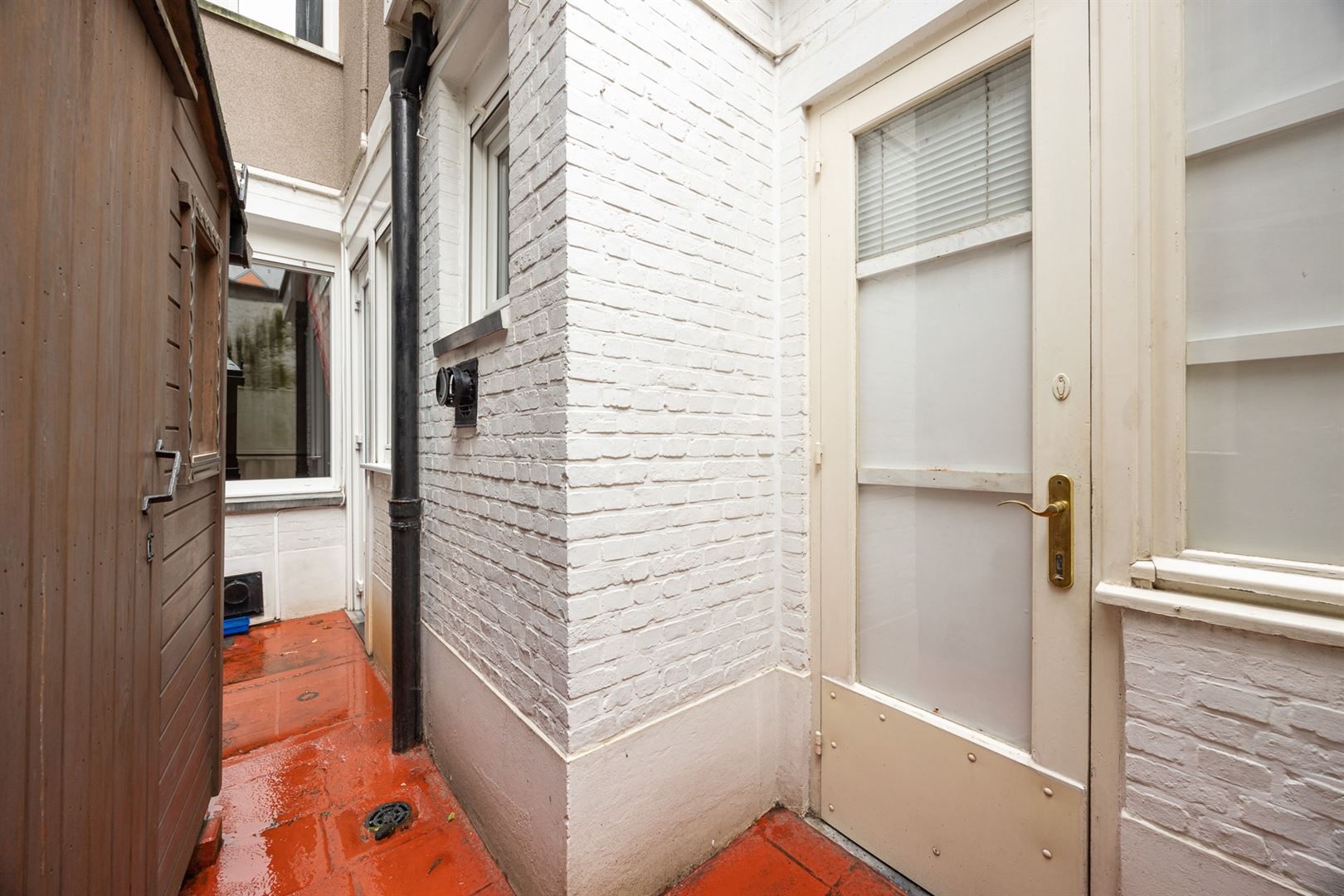 Gelijkvloers appartement met koer in hartje Stad foto 8