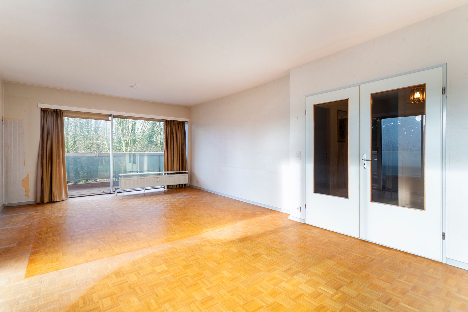 Lichtrijk appartement in het groen met renovatiepotentieel foto 7