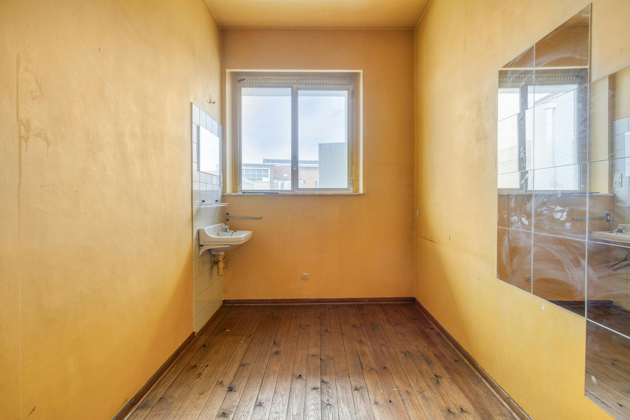 Te renoveren opbrengsteigendom met 3 appartementen en handelspand in Antwerpen foto 23