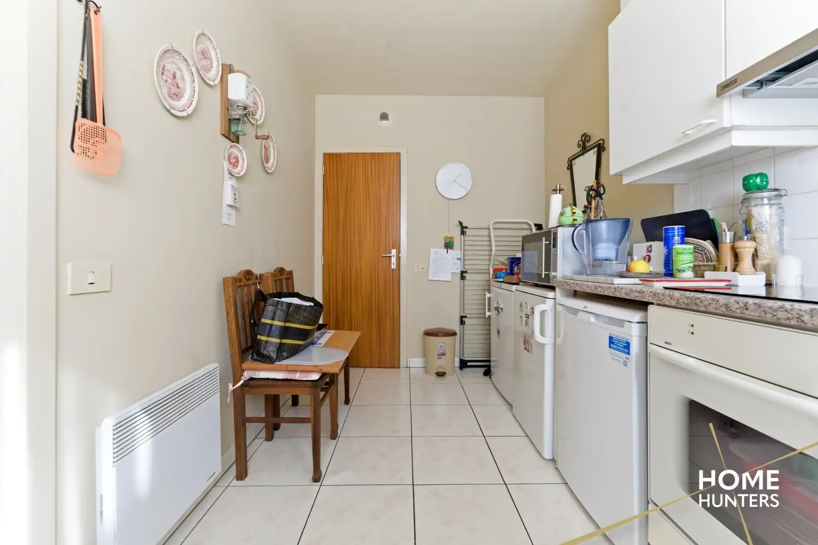 Instapklaar gelijkvloers appartement met 2 slaapkamers en ruime tuin foto 10