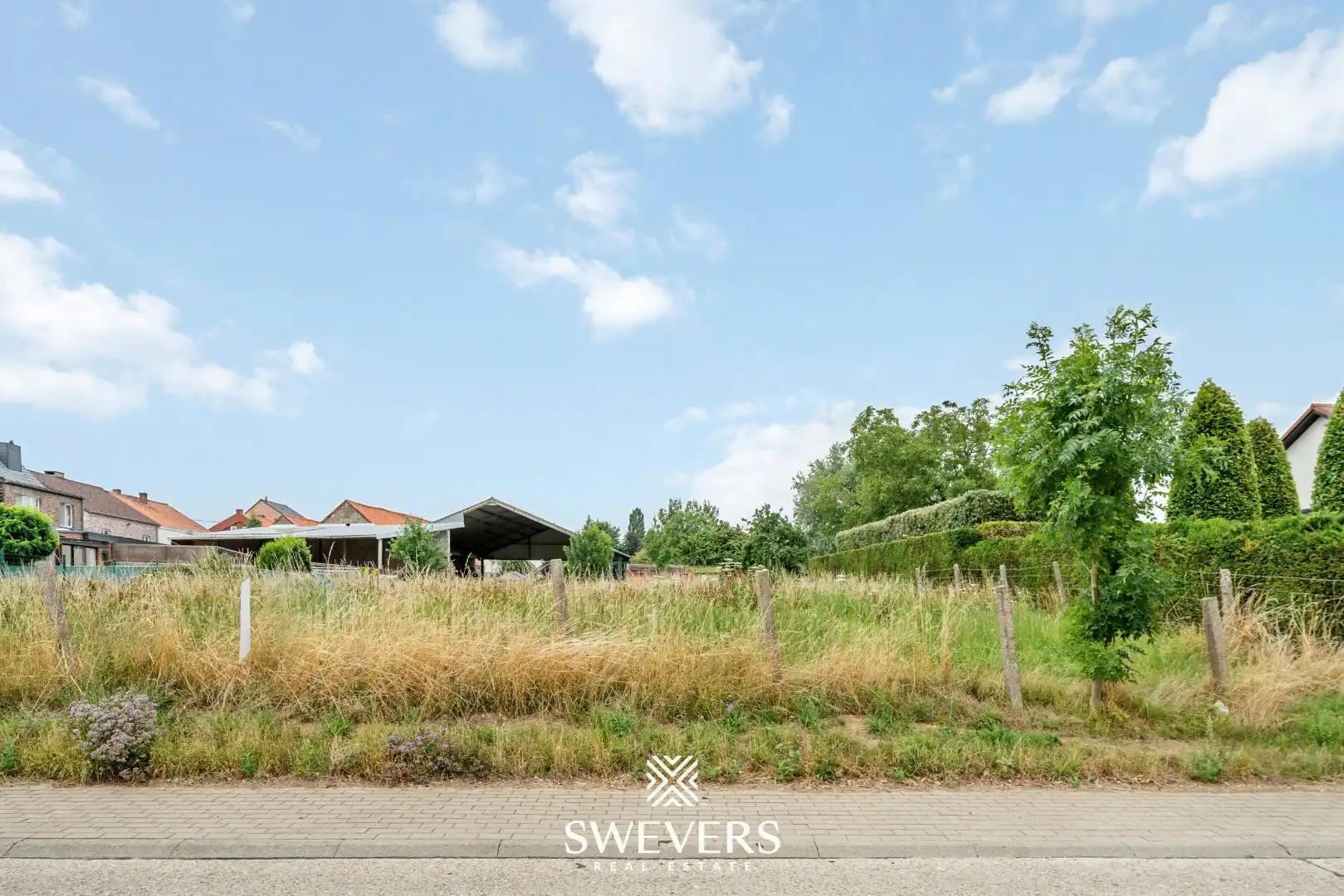 Bouwgrond voor halfopen bebouwing in hartje Riemst foto 7