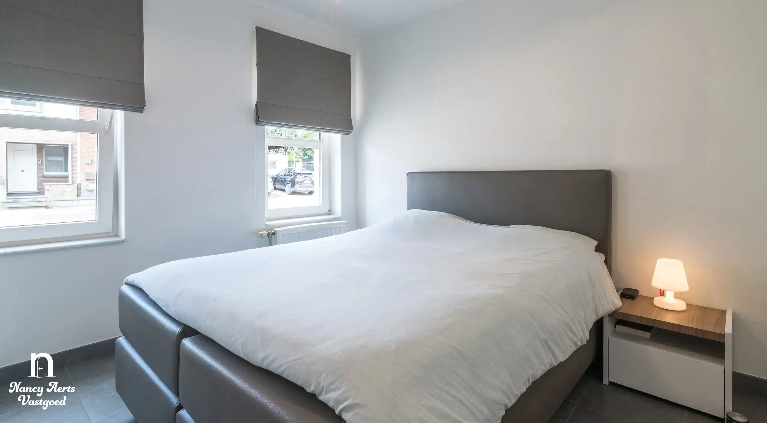 Lichtrijk gelijkvloers appartement met tuin en mooi uitzicht foto 13