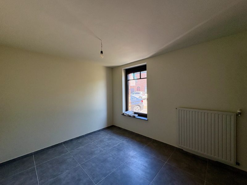 Halfopen bebouwing met 3 slaapkamers en ruime tuin foto 8
