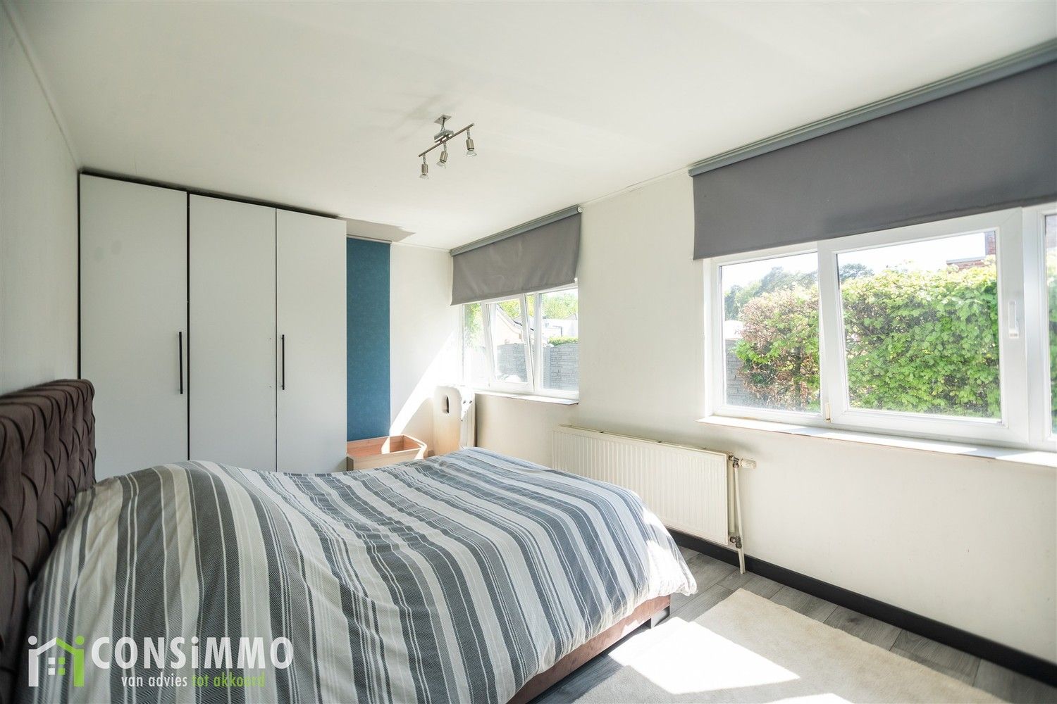 Gelijkvloerse woning met veel potentieel - vergunde nieuwbouwmogelijkheid in Genk foto 12