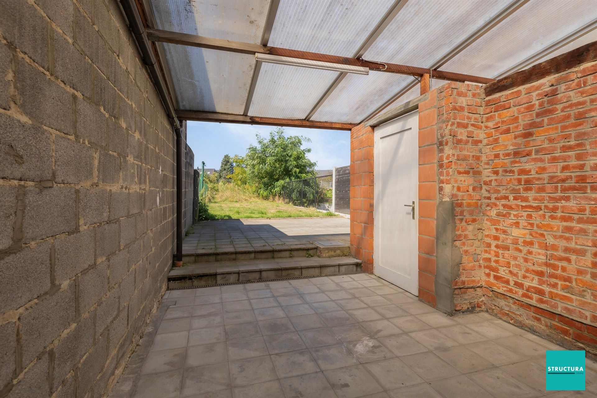 Woning met veel potentieel in het hart van Merchtem foto 21