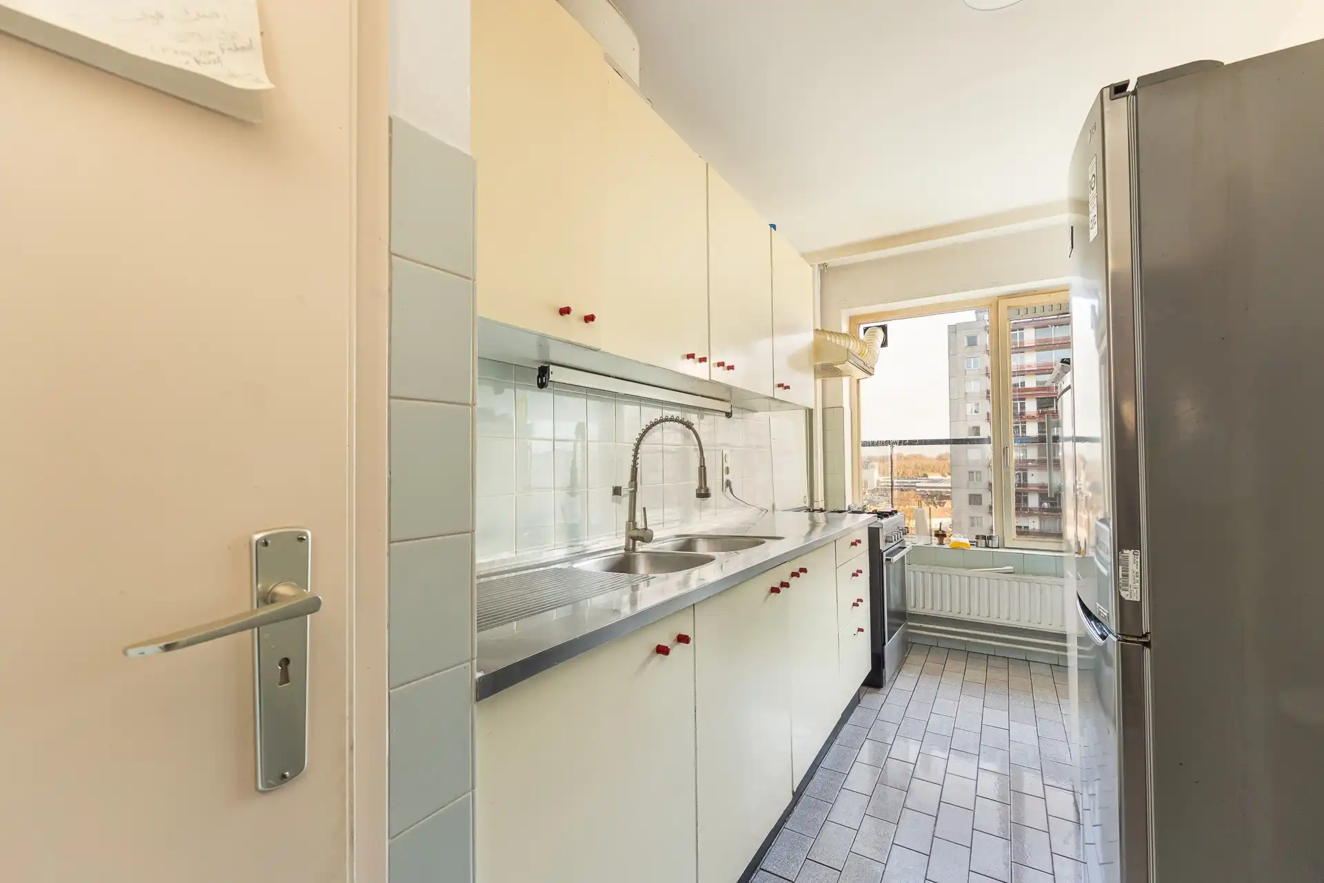 Ruim 3-slpk app met grote leefruimte en terras op 9de verd foto 8