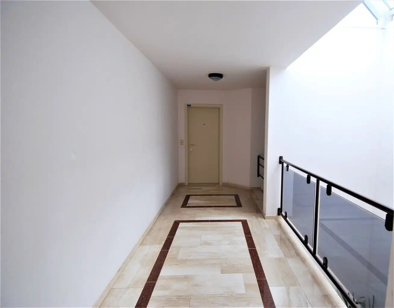 Ruim appartement met 2 slaapkamers, 2 terrasjes en ondergrondse autostaanplaats foto 11