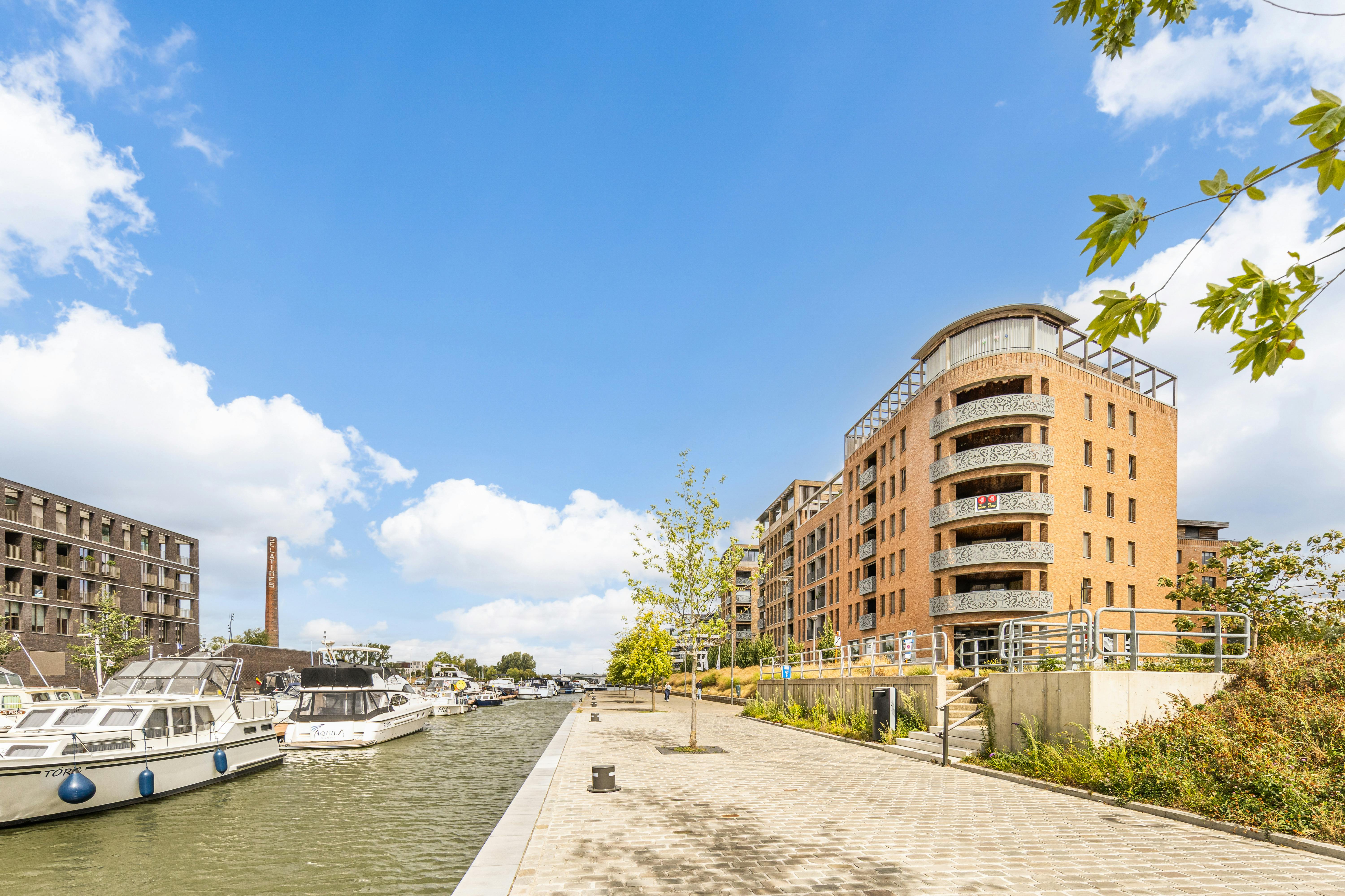 Exclusief hoekappartement aan het water met ruim zonneterras foto 23