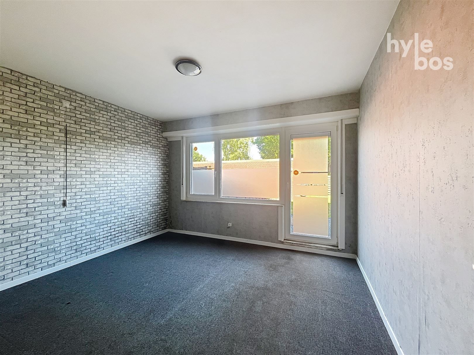 Gelijkvloers 2 slaapkamer appartement met tuin en garage foto 9
