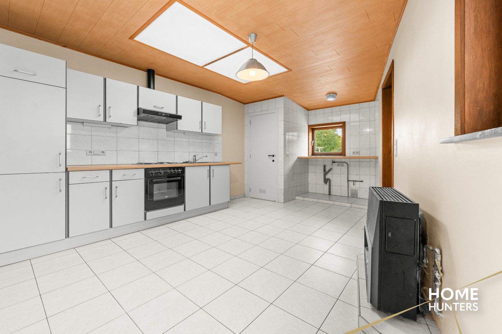 Halfopen gezinswoning met 3 slpks, carport en diepe tuin in Dikkebus foto 6