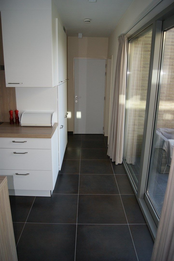 Lichtrijk 2-slp appartement (90 m²) met ruim zonneterras en autostaanplaats. foto 18