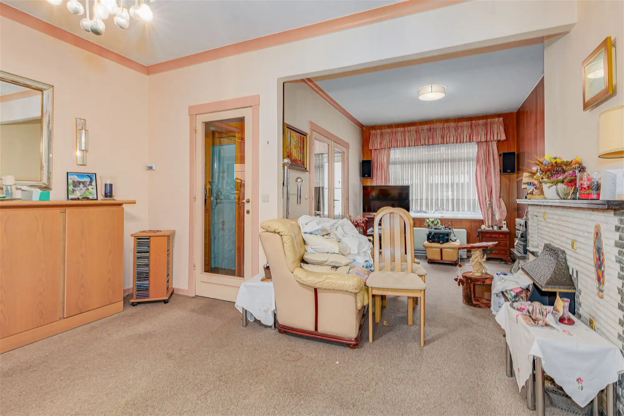 Te renoveren woning met tuin in Merksem foto 3