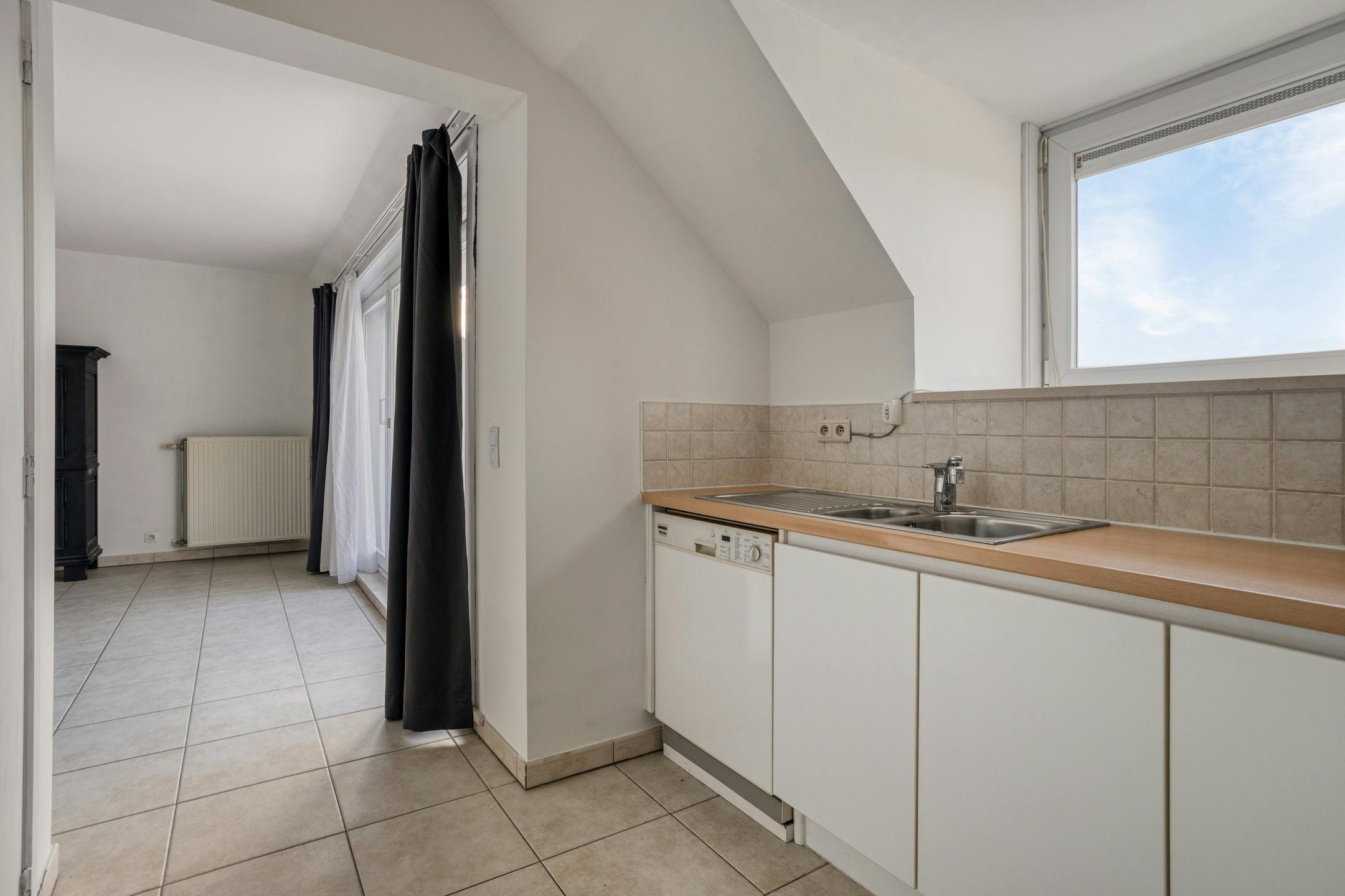 Instapklaar en energiezuinig appartement in centrum Roeselare foto 8