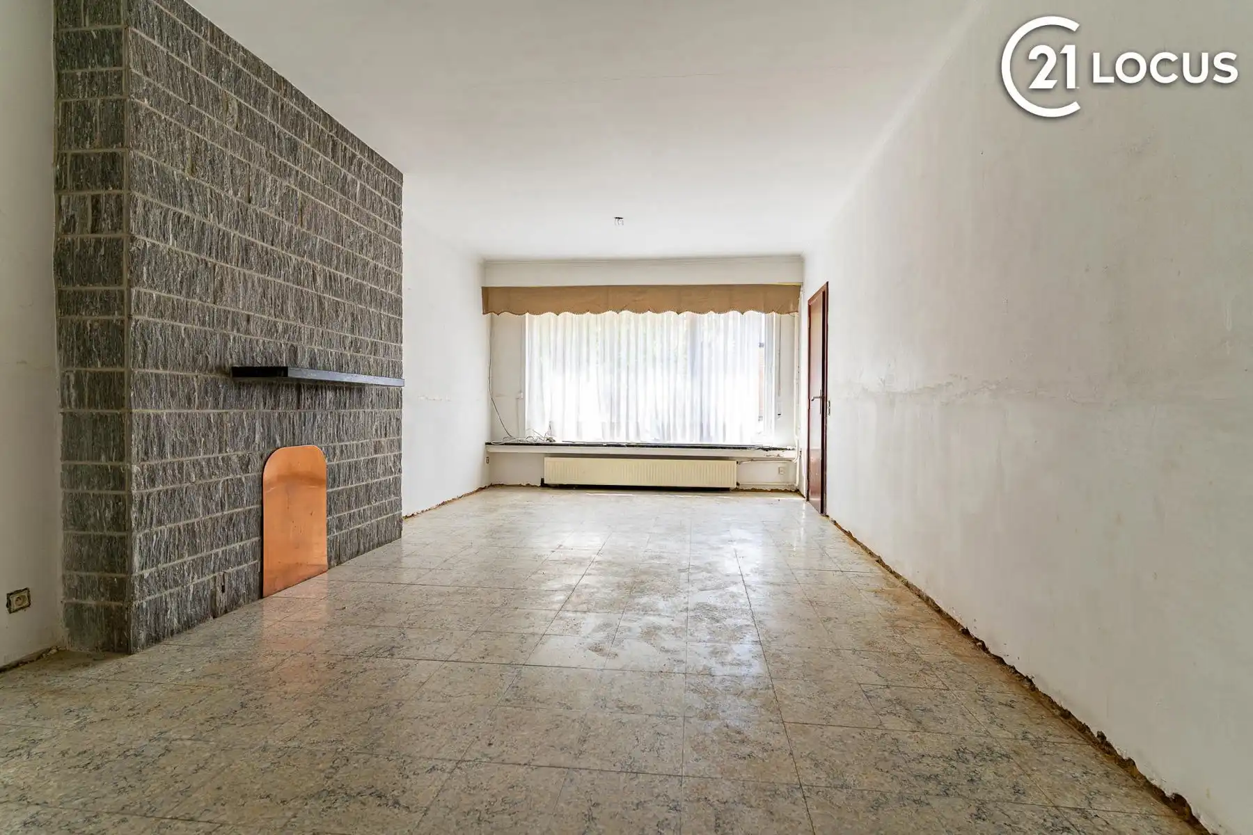 Instapklare HOB met 3 slaapkamers en tuin in hartje Beveren! foto 2